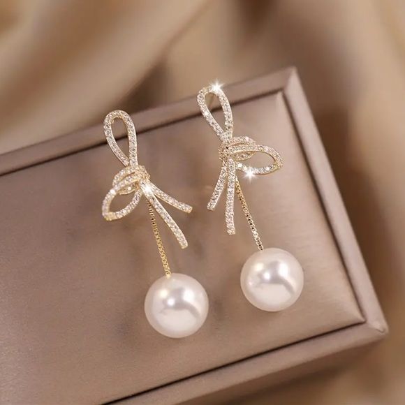 Pearl Bow Spark Drop Earrings